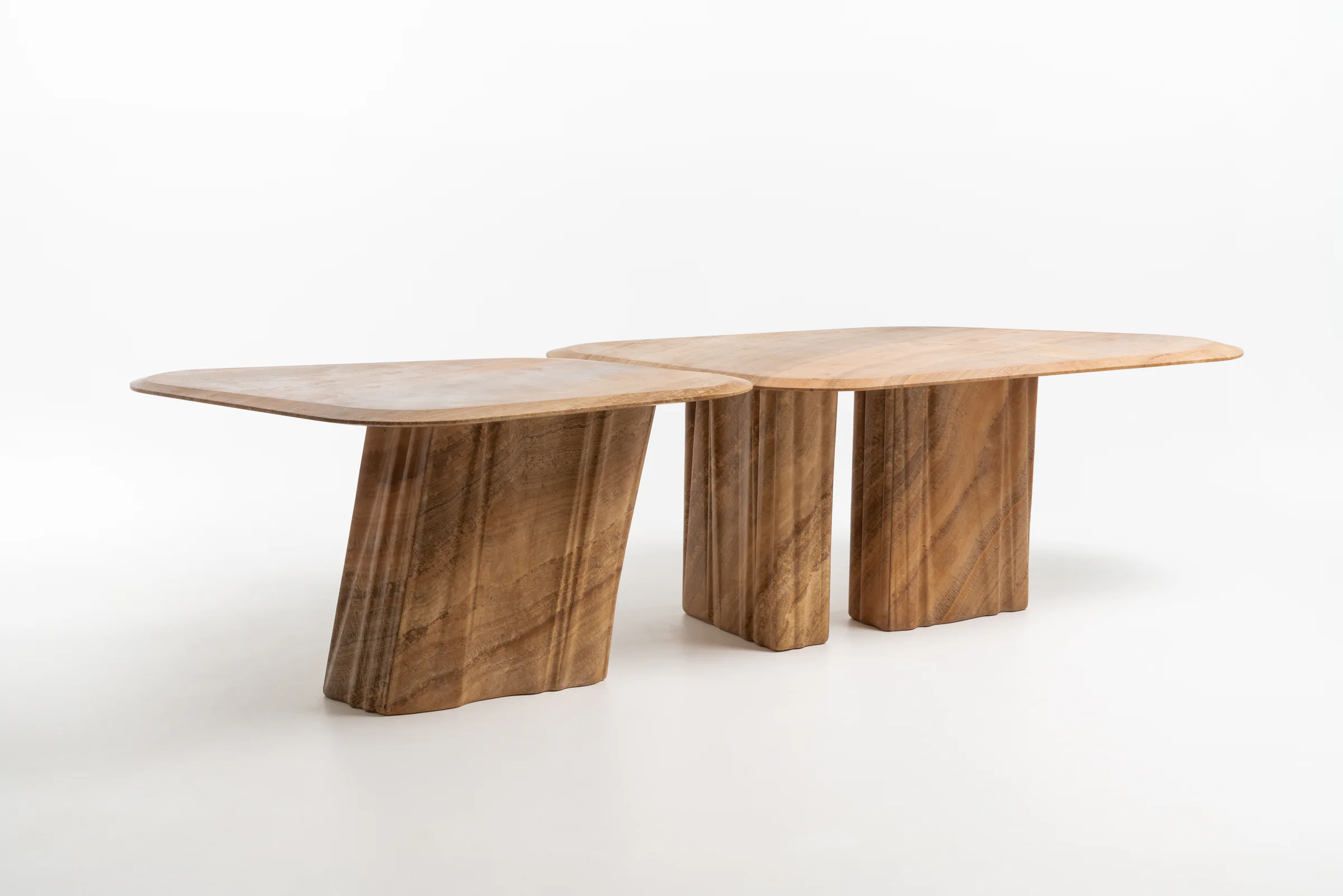 Wave dining tables in a studio view