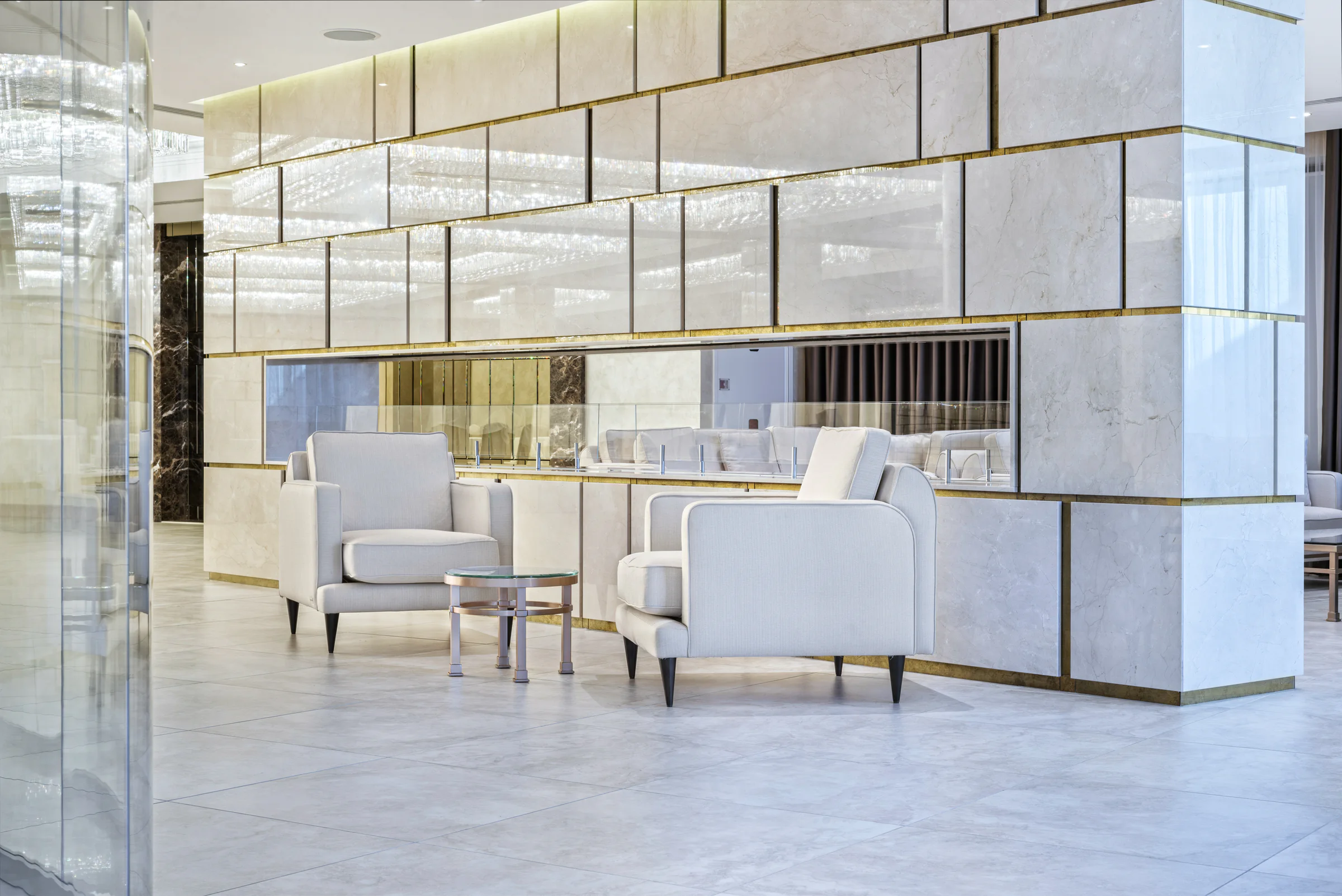 Polished stone wall seen along the seating area
