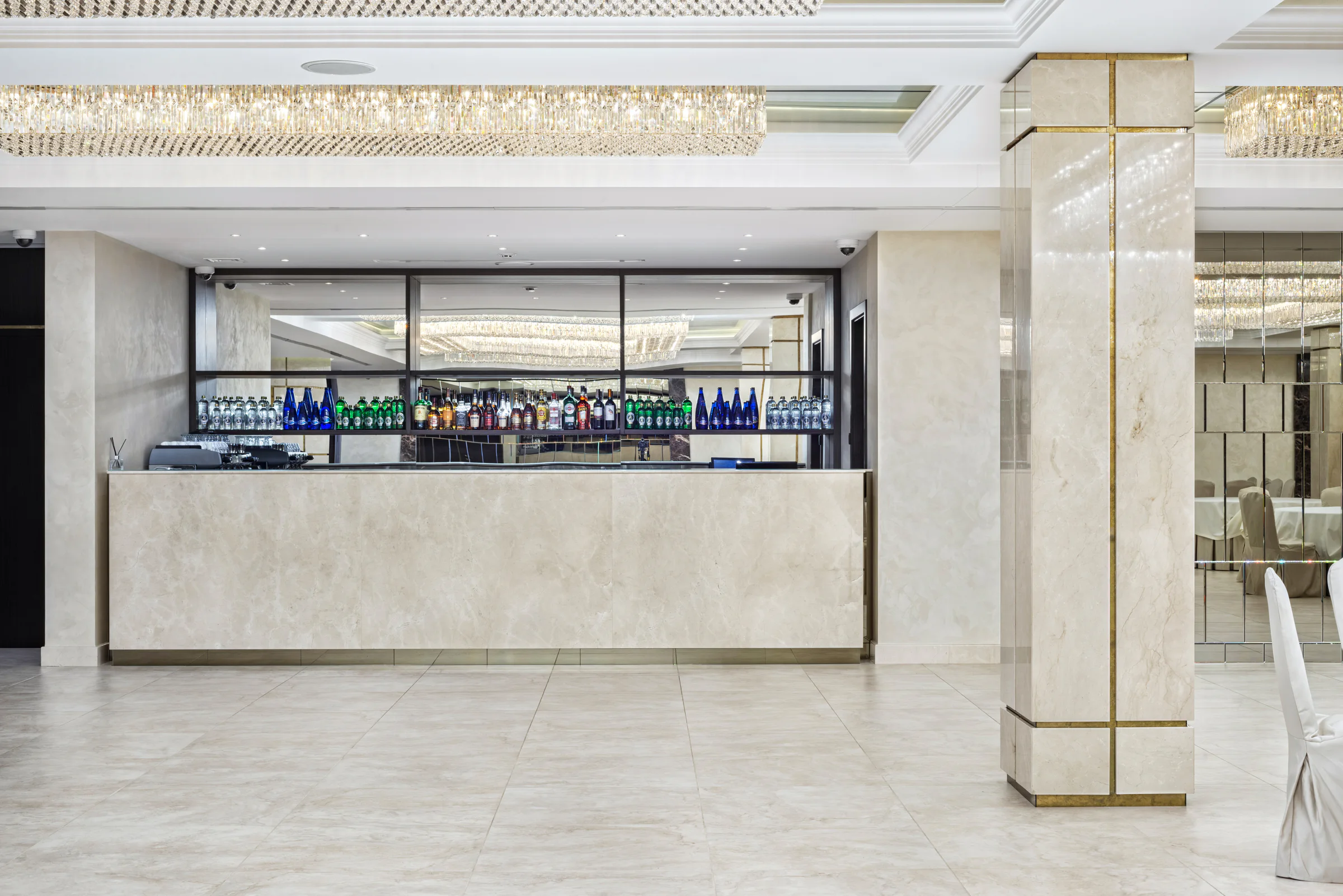 Long stone counter and surrounding stone flooring