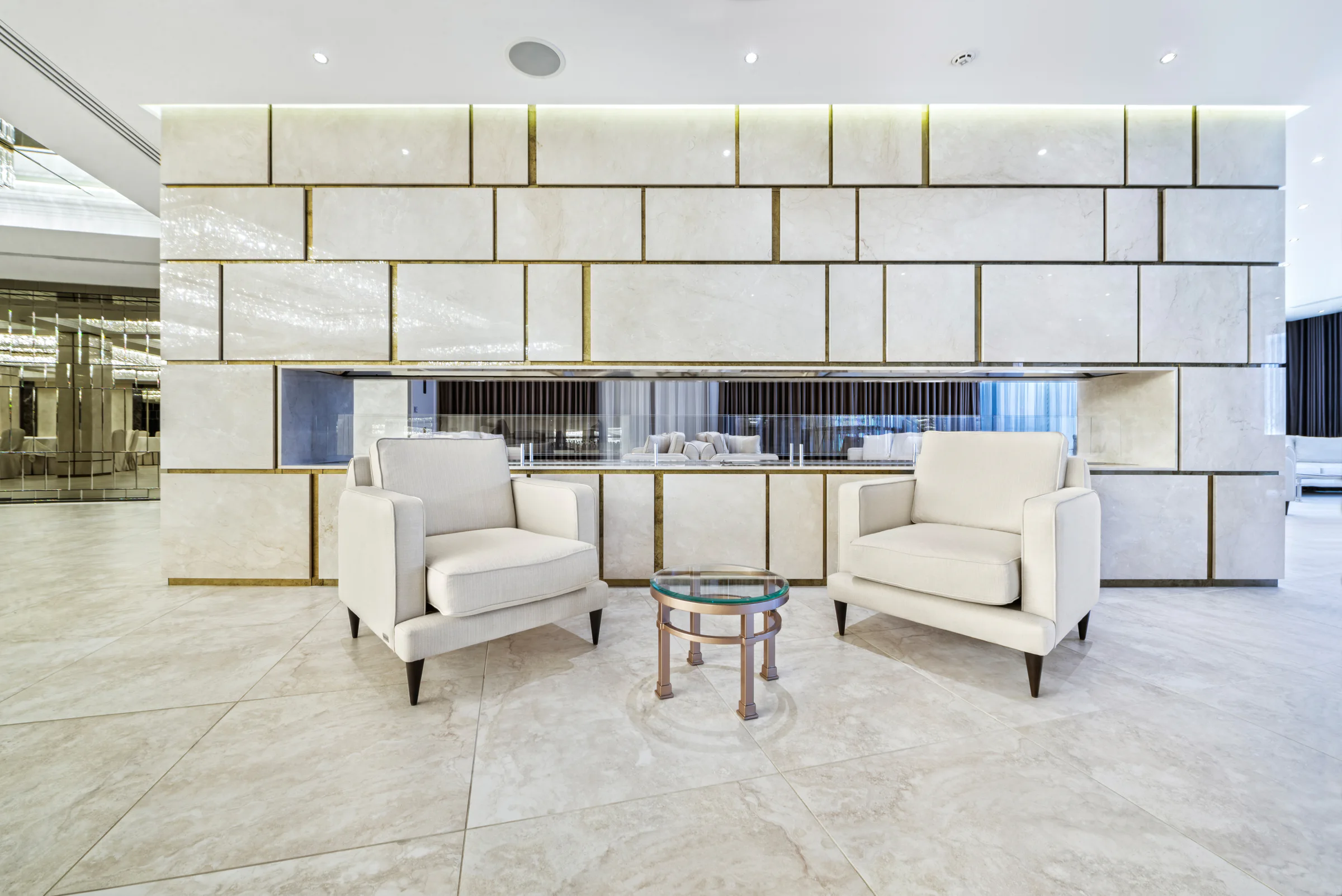 Polished stone wall panels and floor at Regent Hill