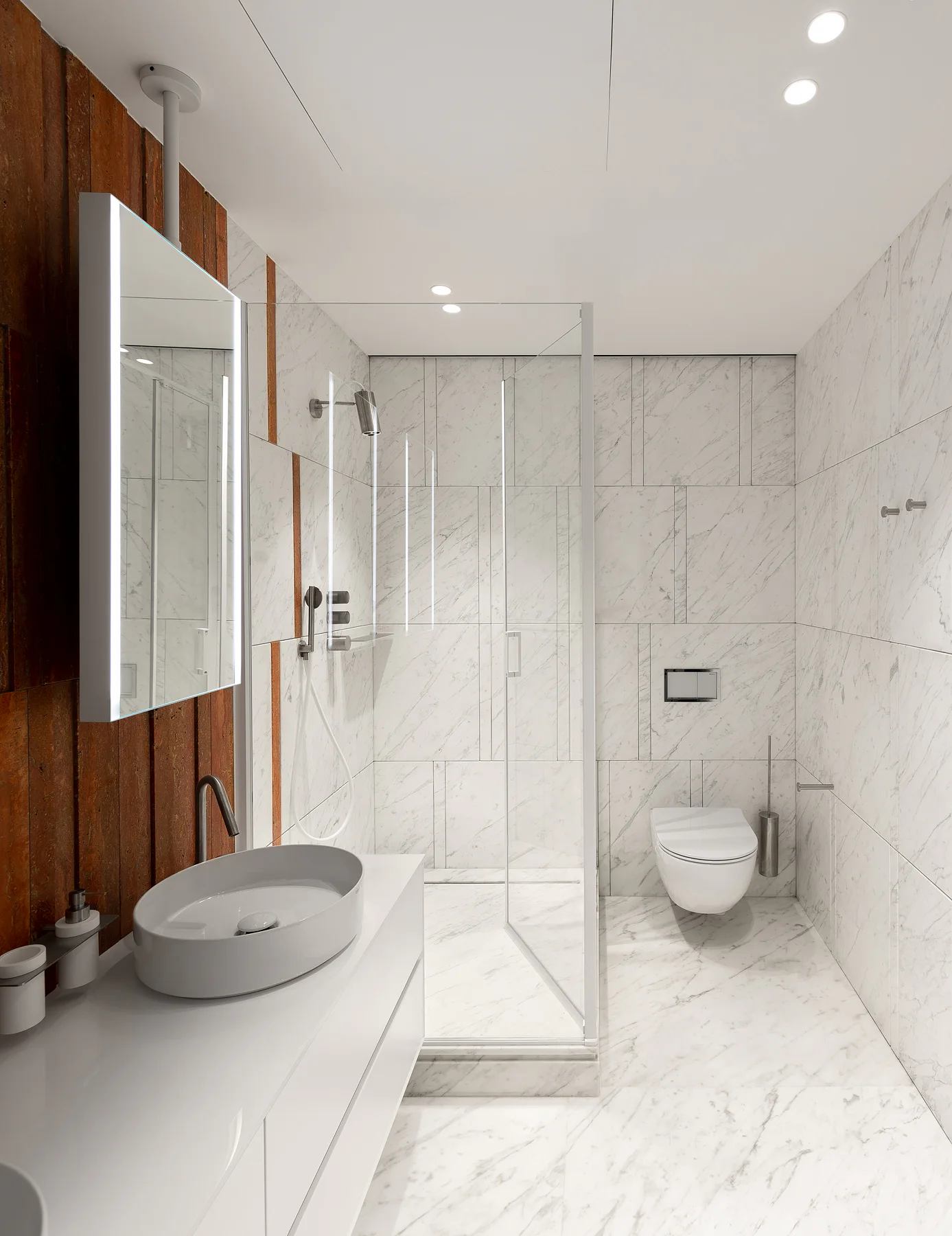 Light veined stone surfaces in the bathroom